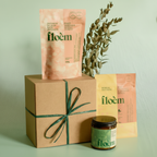Floèm Nordic Spa gift box with herbal tea pouch amber candle and kraft box with teal ribbon — Canadian wellness gift — Sensory for Calm
