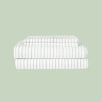 Essential Organic Percale sheet set in leaf frame — organic cotton bedding — Sensory for Calm