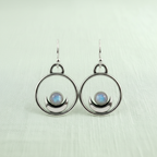 Dream Earrings hero - linen background