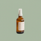 Misiyo Lavender Unwind room and linen spray — back of bottle upright on sage background — Canadian natural home fragrance — Sensory for Calm