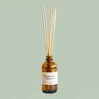 Misiyo Rosewood and Amethyst reed diffuser in amber glass bottle with rattan reeds — natural home fragrance — Sensory for Calm