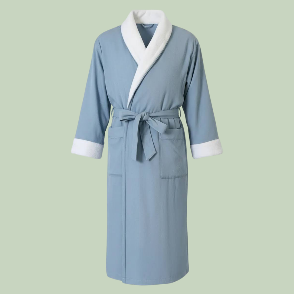 Skylark+Owl Essential Plush Bathrobe in blue, front view with white shawl collar, white cuffs, tied waist belt, two pockets — Sensory for Calm