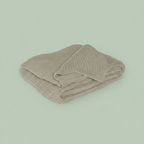 Greige waffle knit extended throw blanket folded — soft oversized cozy blanket — Sensory for Calm